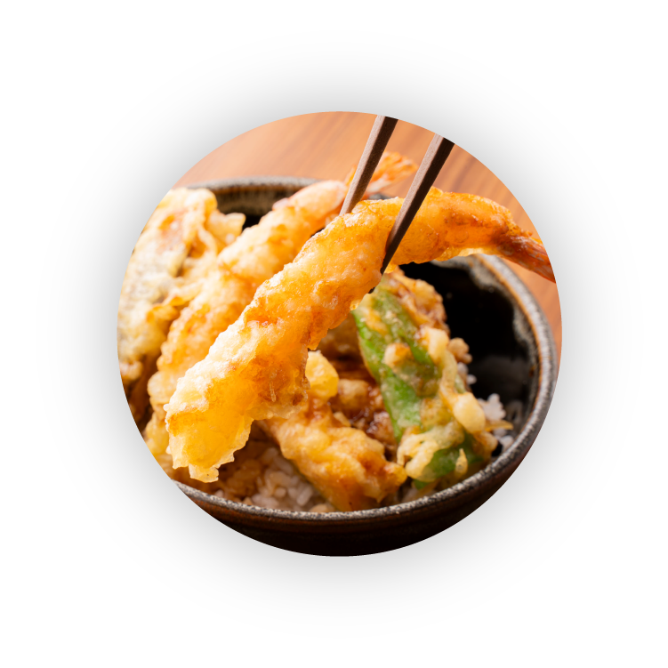 エビ天を持ち上げている写真